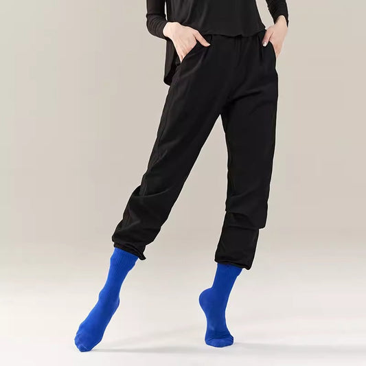 "Black fitted trousers classical dance costume."